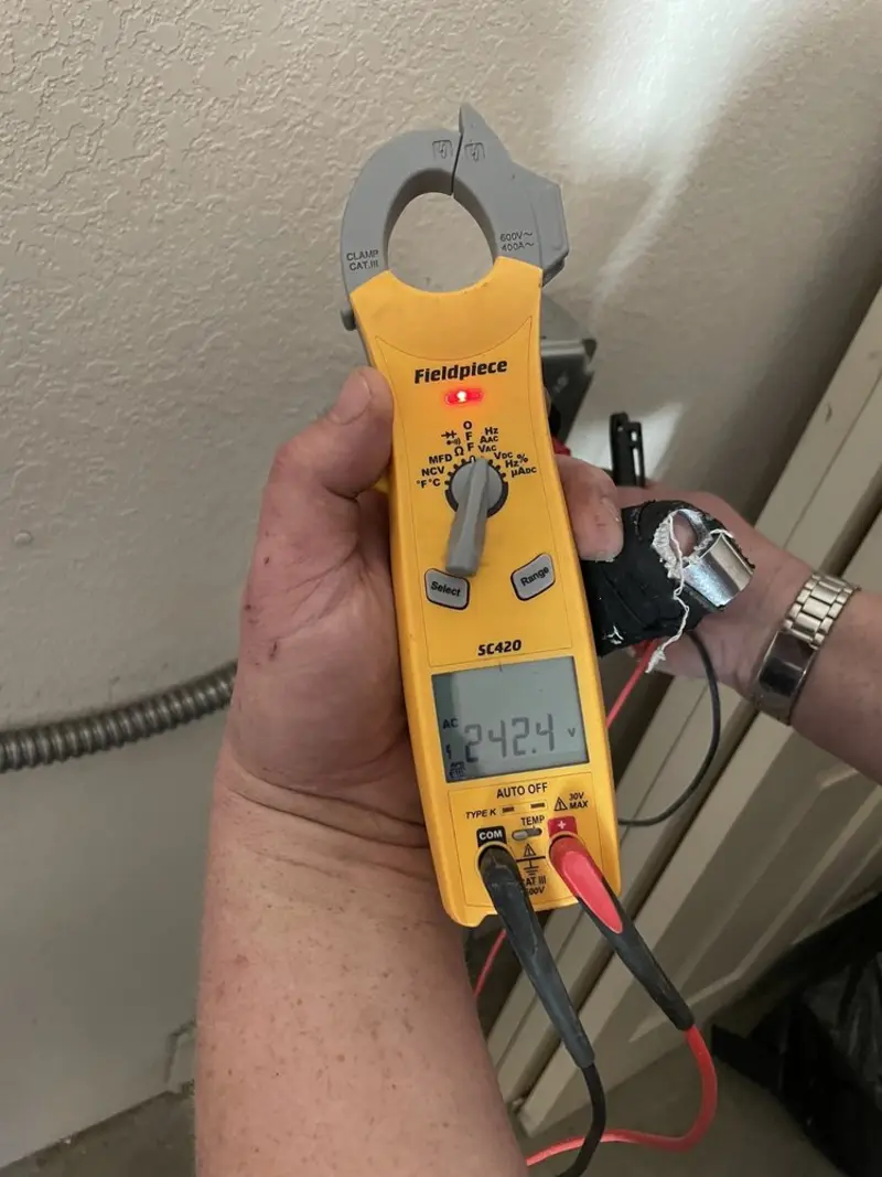 Voltage testing with clamp meter during Whole House Surge Protector in Halfway